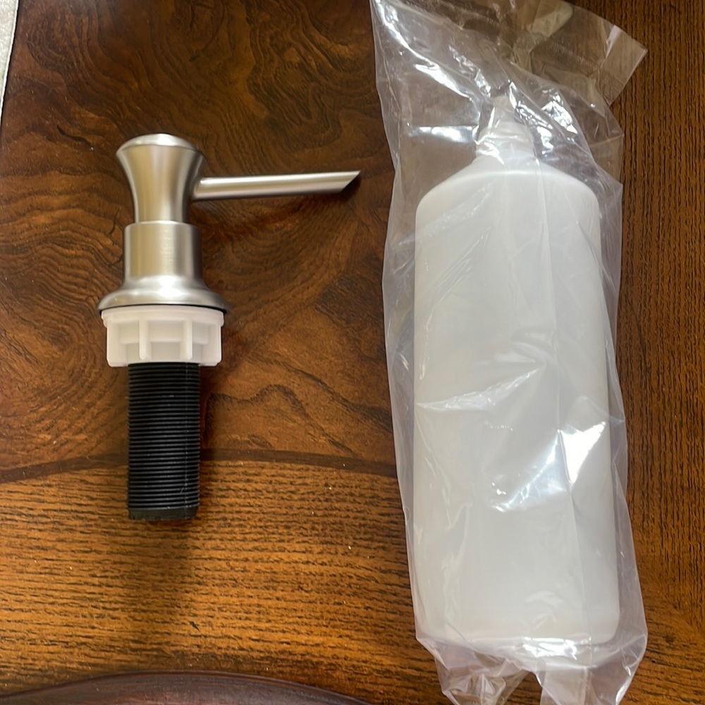 Brand new soap dispenser for sink